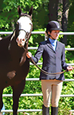One of our residents awaits her turn in competitive Show Riding at McLendon Hills